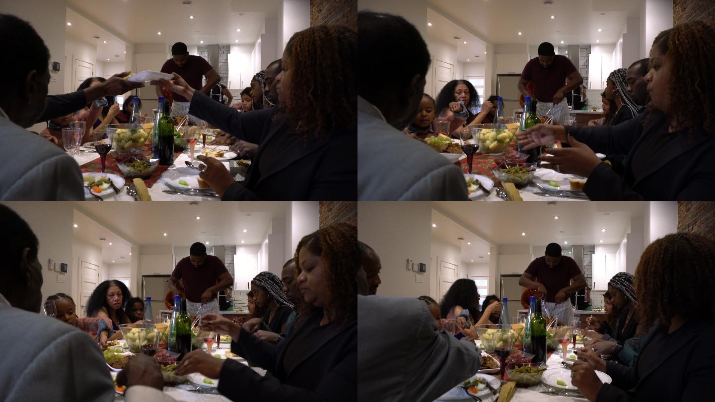 大型非裔美国人家庭感恩节圣诞餐车派对