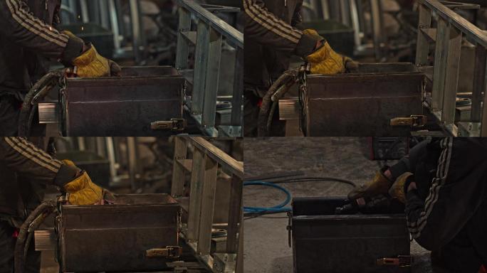 电焊工人使用气焊切割焊接钢板