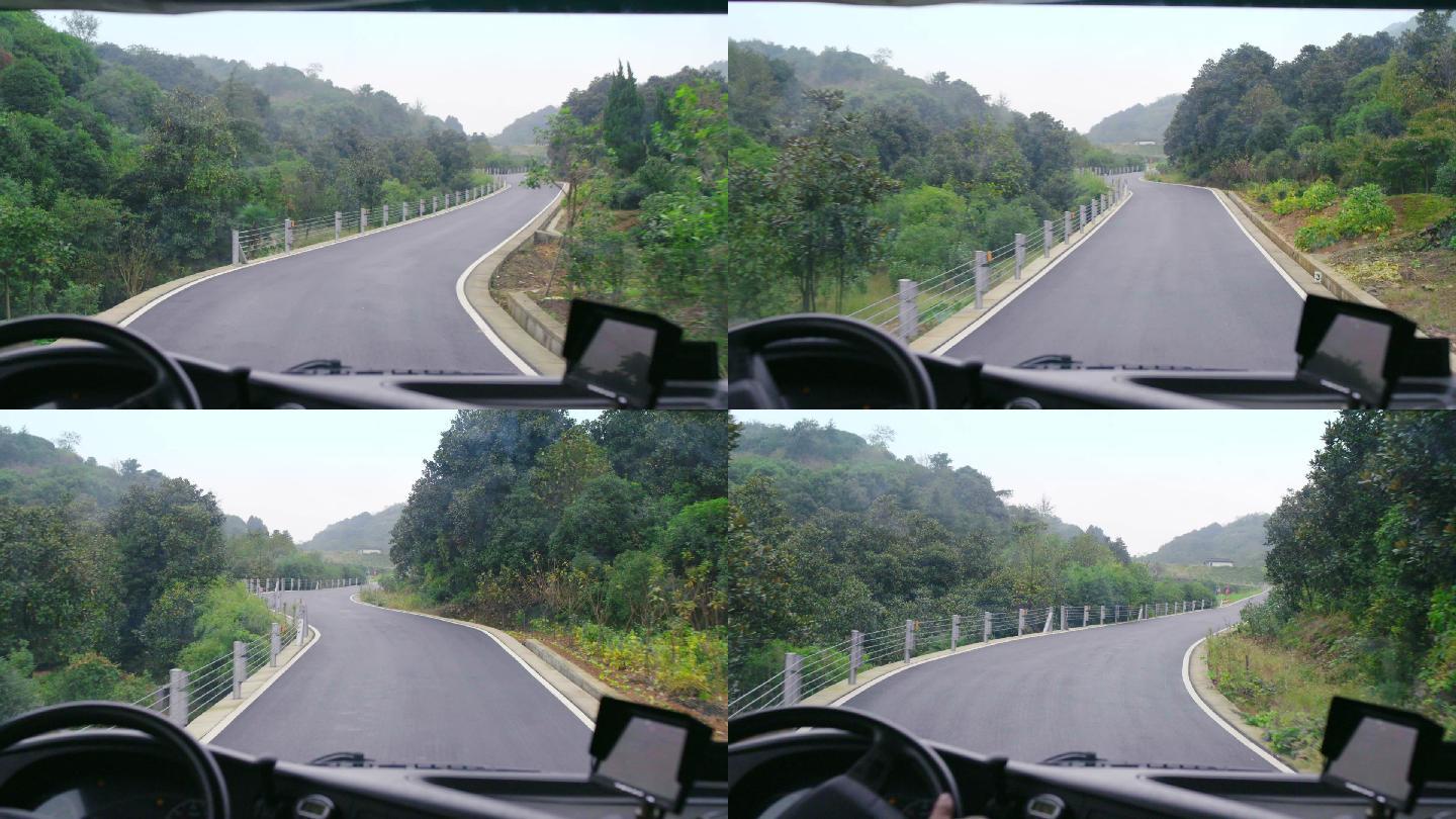 第一视角拍摄汽车行驶在弯曲的山路上