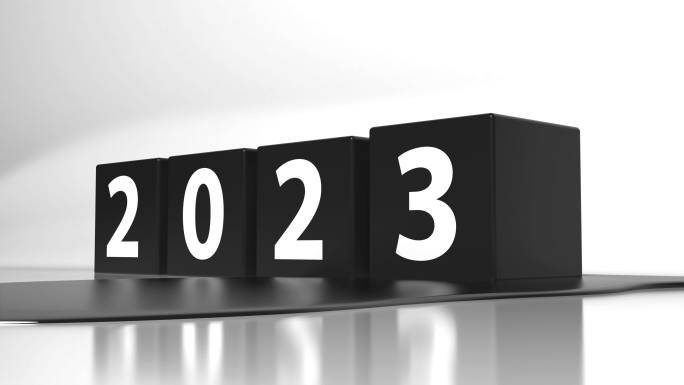再见2022，欢迎2023。带数字的黑色立方体侧视图