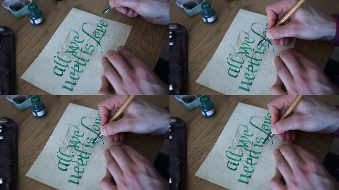 年轻人用绿墨水在纸上练习书法