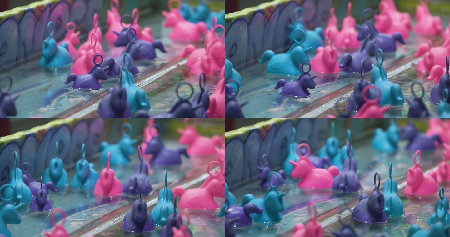 漂浮在水面上的小塑料玩具独角兽
