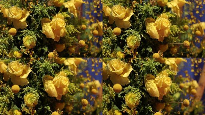慢镜头黄花，黄玫瑰，黄花束，花店里一大束鲜黄色玫瑰的特写镜头，婚礼花，婚礼装饰中的黄玫瑰