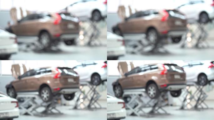 汽车服务、运输和维修车概念中汽车背景模糊的4k镜头场景