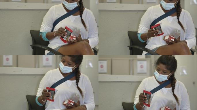 献血后吃零食的女人