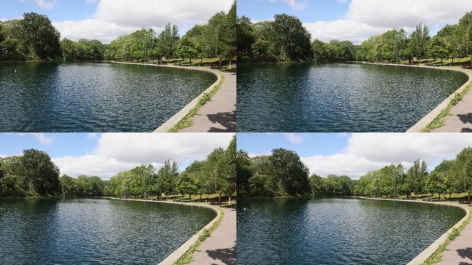 蒙特利尔拉方丹公园池塘在一个阳光明媚的夏末，在4k分辨率的视频