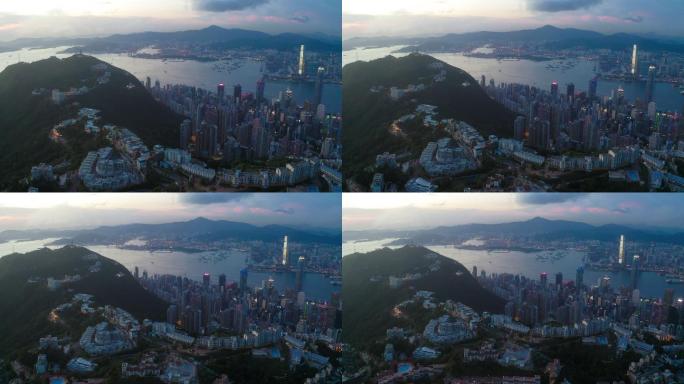 日落时香港城和维多利亚港鸟瞰图