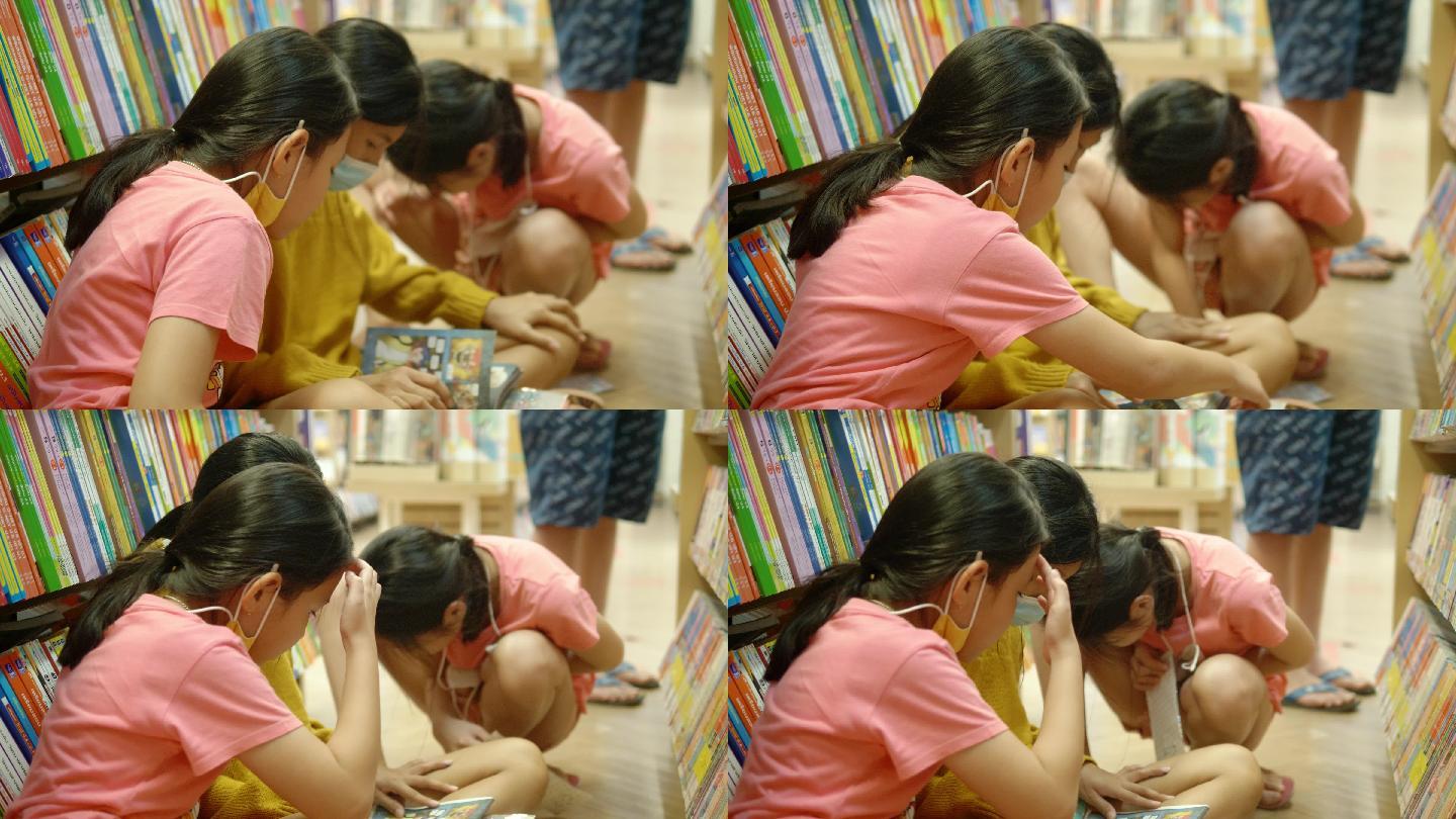 快乐的亚洲孩子坐在地板上，一起在书店看书，生活方式理念。