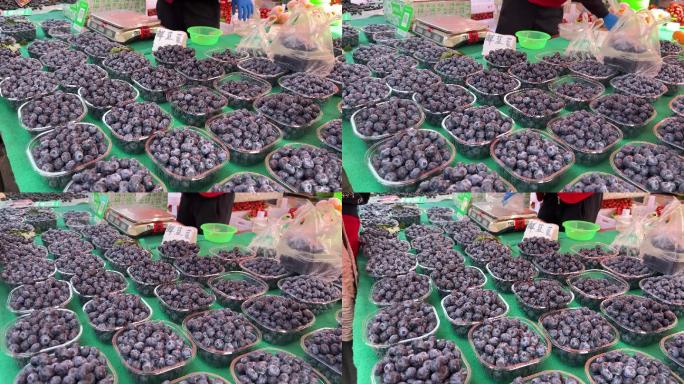 市场卖蓝莓水果摊商贩 (2)