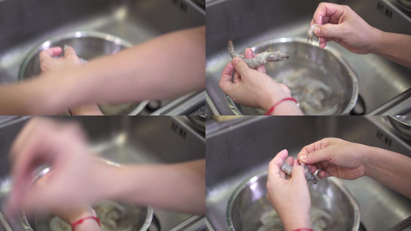 女人的手清洗虾和剥皮虾