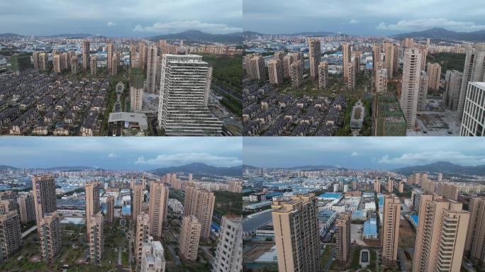 航拍雨后清新的威海威高七彩城楼盘街景