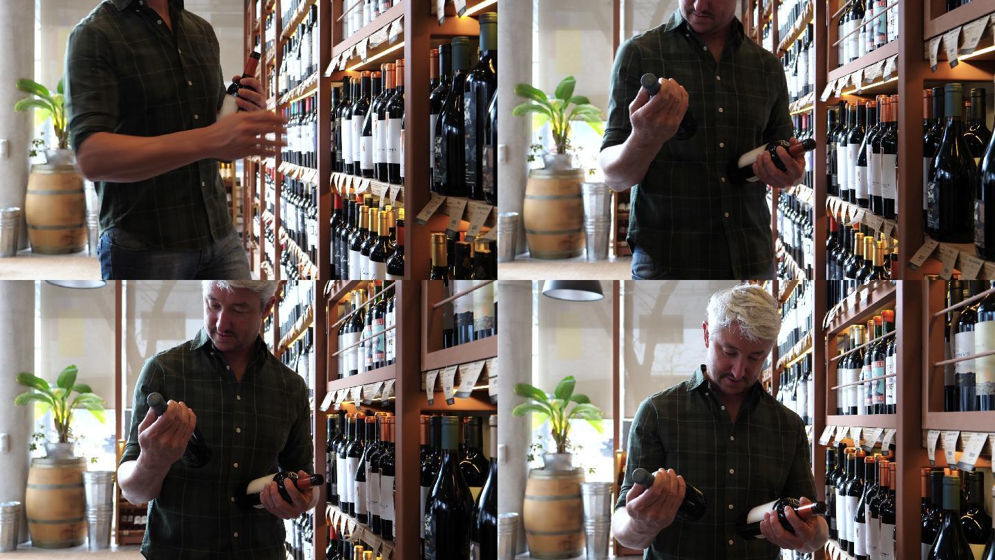 成年男性正在寻找一瓶葡萄酒，并在货架上寻找不同的选择