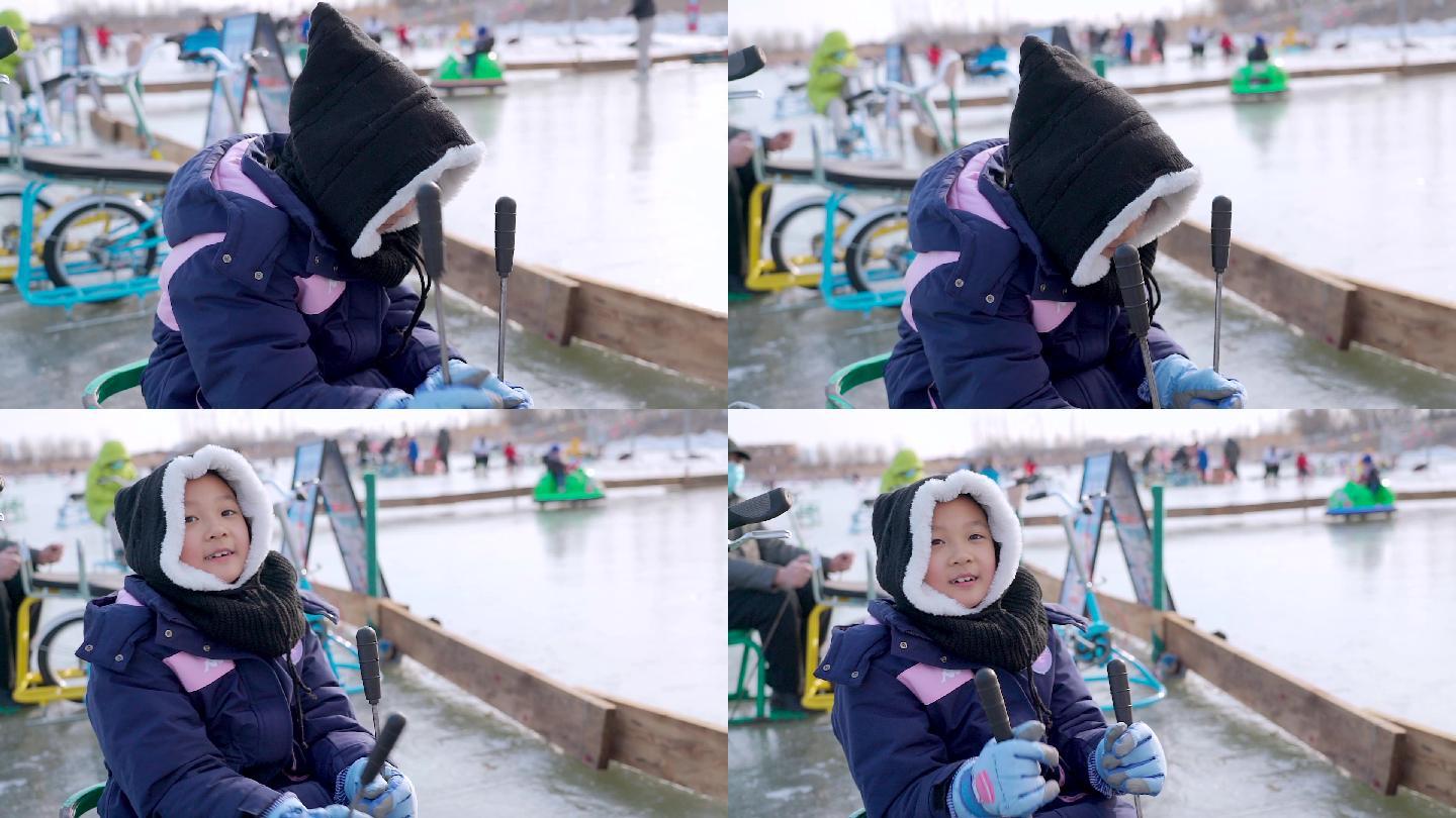 冬季在露天冰场玩耍的中国女孩
