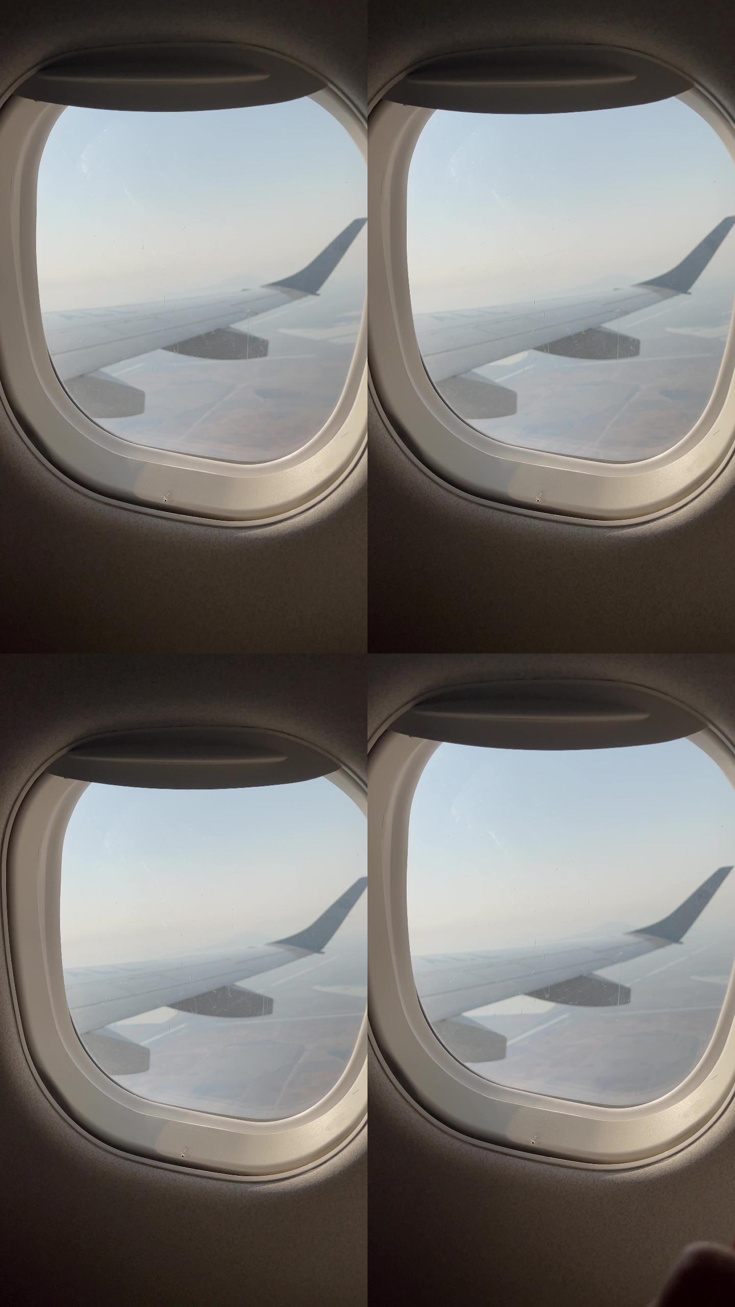 旅行期间拍摄飞机窗口-移动摄像机视角