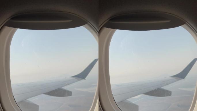旅行期间拍摄飞机窗口-移动摄像机视角