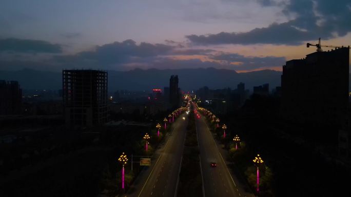 城市道路日转夜延时夜景航拍宣传片空镜头