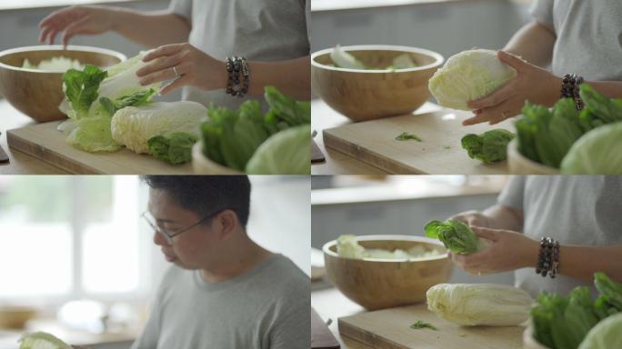 亚裔中国男子在厨房柜台上剥蔬菜特写