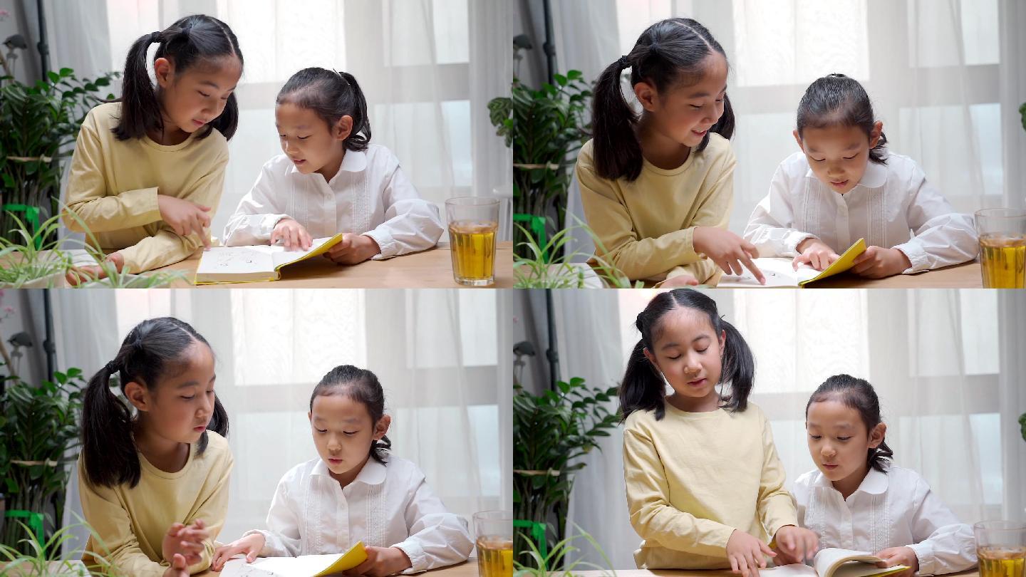 两名学习写作业亚裔女孩