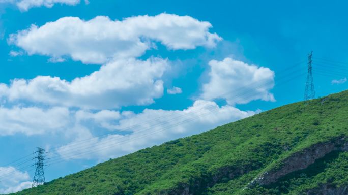 蓝天白云青青绿草山坡山地帮延时摄影