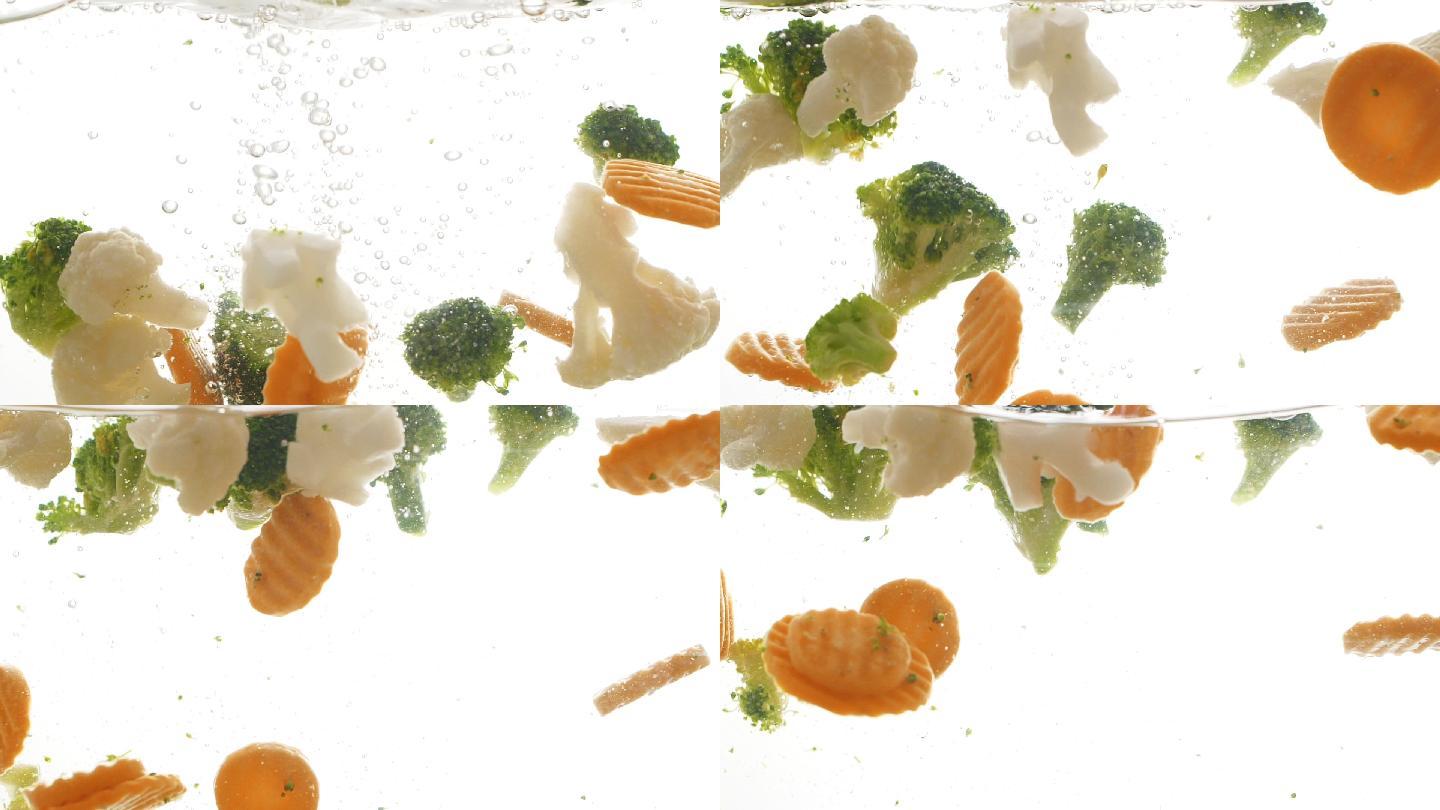 蔬菜掉入水中的慢动作视频
