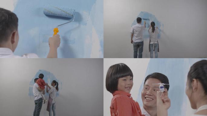幸福一家三口宝宝和爸爸妈妈刷油漆家庭装修