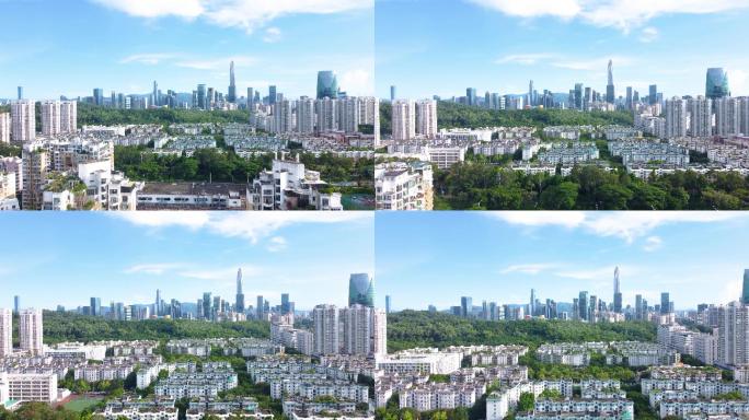 无人机航空摄影通过深圳福田住宅区俯瞰福田CBD和莲花山公园