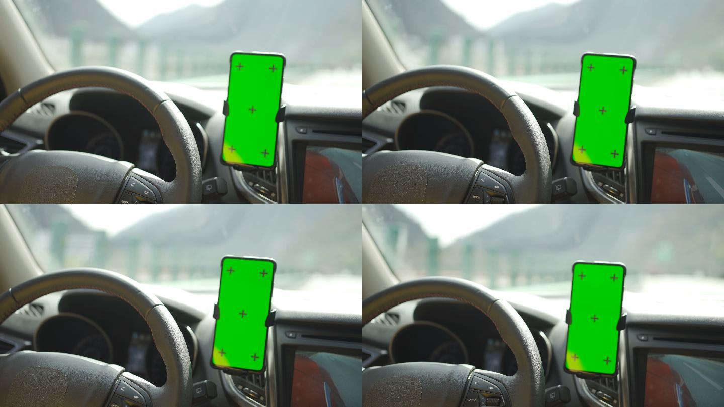 在驾驶时使用绿色屏幕的智能手机