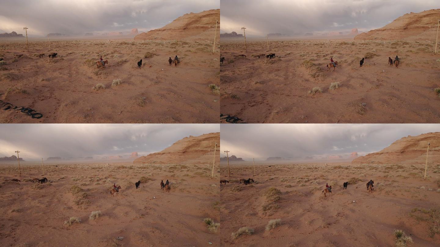纳瓦霍家族在亚利桑那州纪念碑谷的土地上骑马，背景是标志性的纪念碑