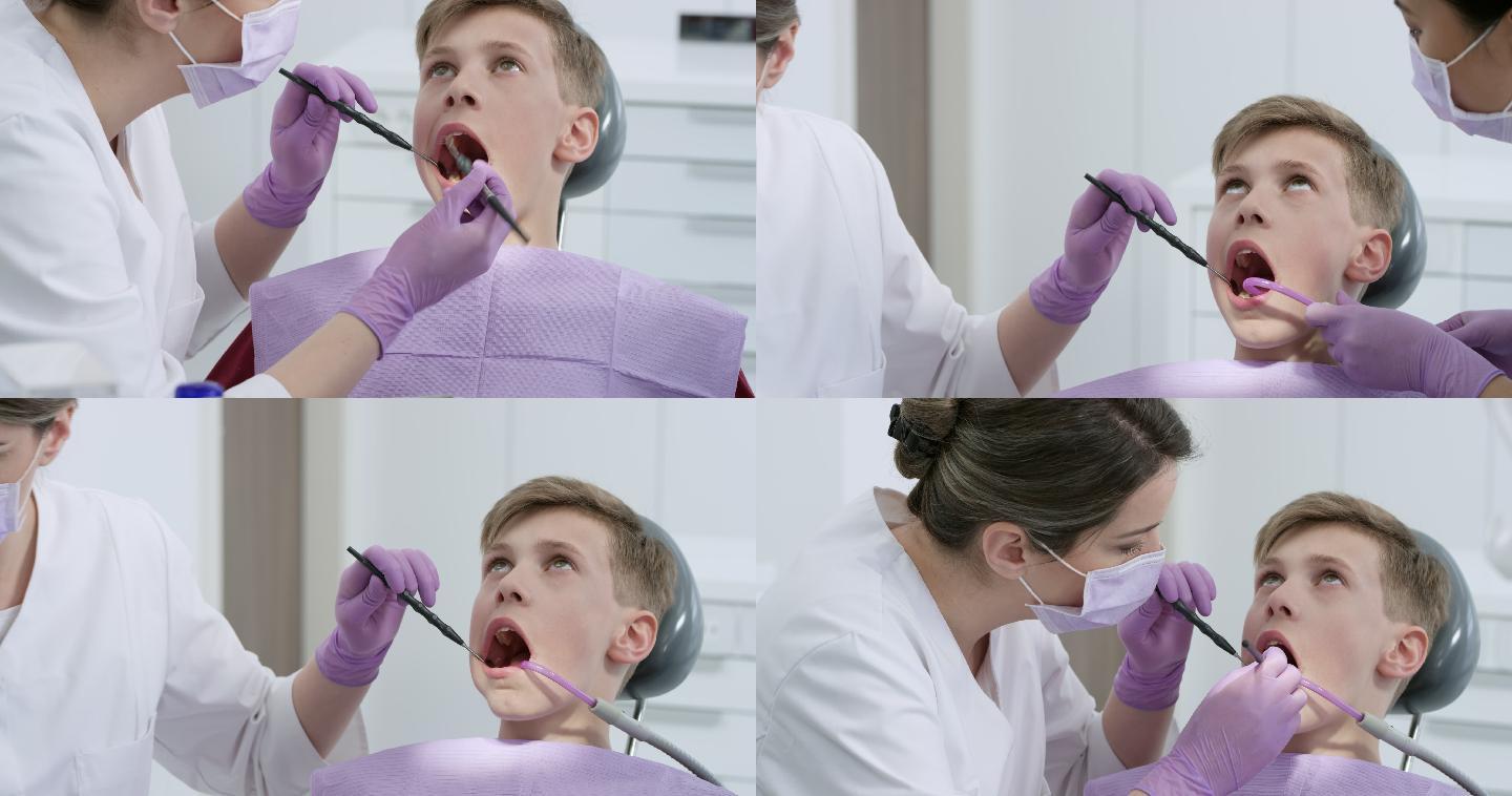一个男孩在牙医办公室修了牙