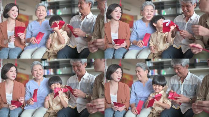春节家庭团圆夫妇带着孩子去祖父母家给父母红包红包繁荣幸福