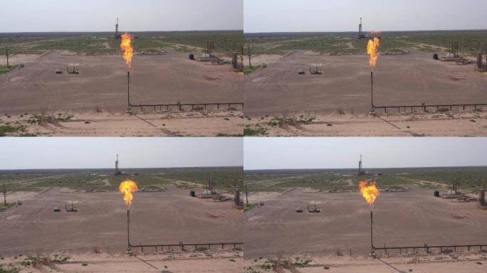 新墨西哥州一台水力压裂钻机的空中无人机剪辑，气体燃烧