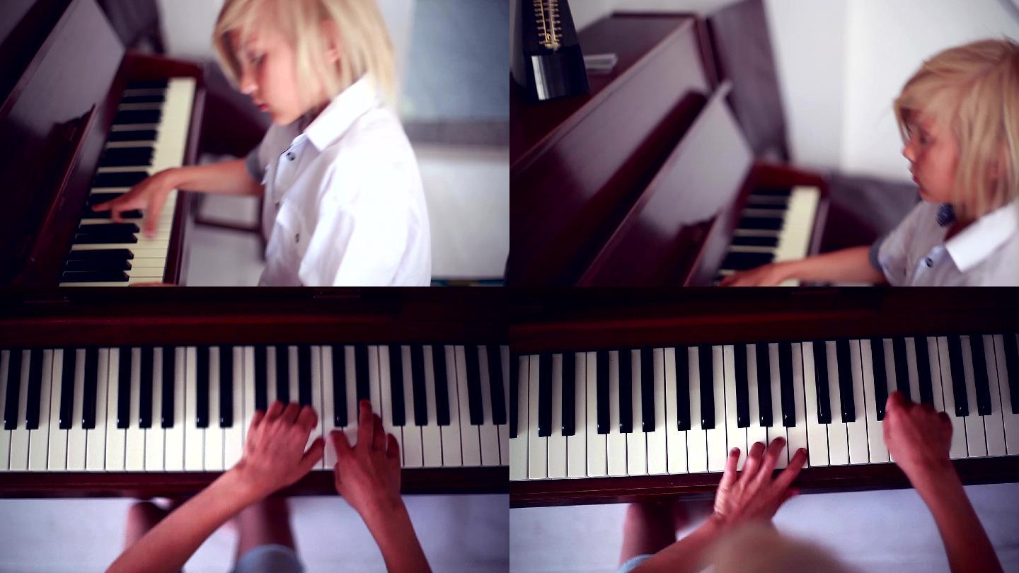 弹钢琴的金发男孩学钢琴音乐艺术