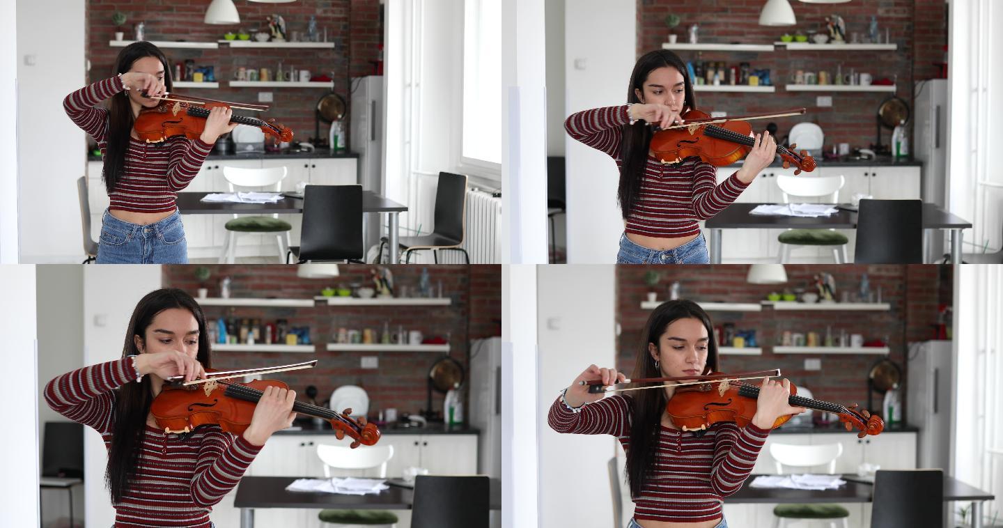 这位年轻的小提琴手在公寓的客厅里拉小提琴，她全神贯注于自己创作的艺术。
