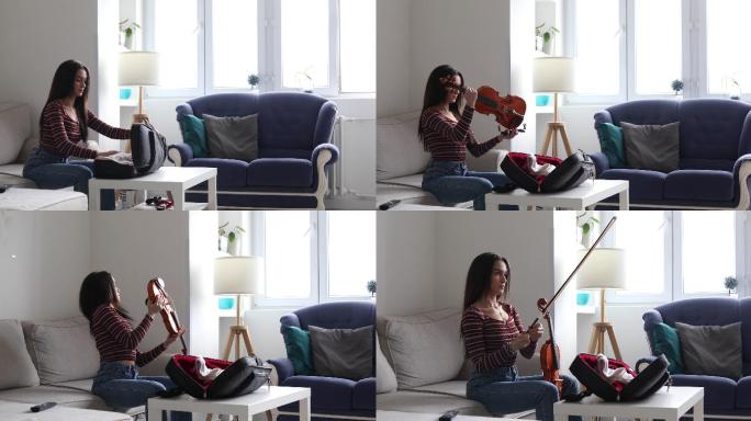 小提琴手从提琴袋中取出小提琴和琴弓，开始在家里练习演奏。