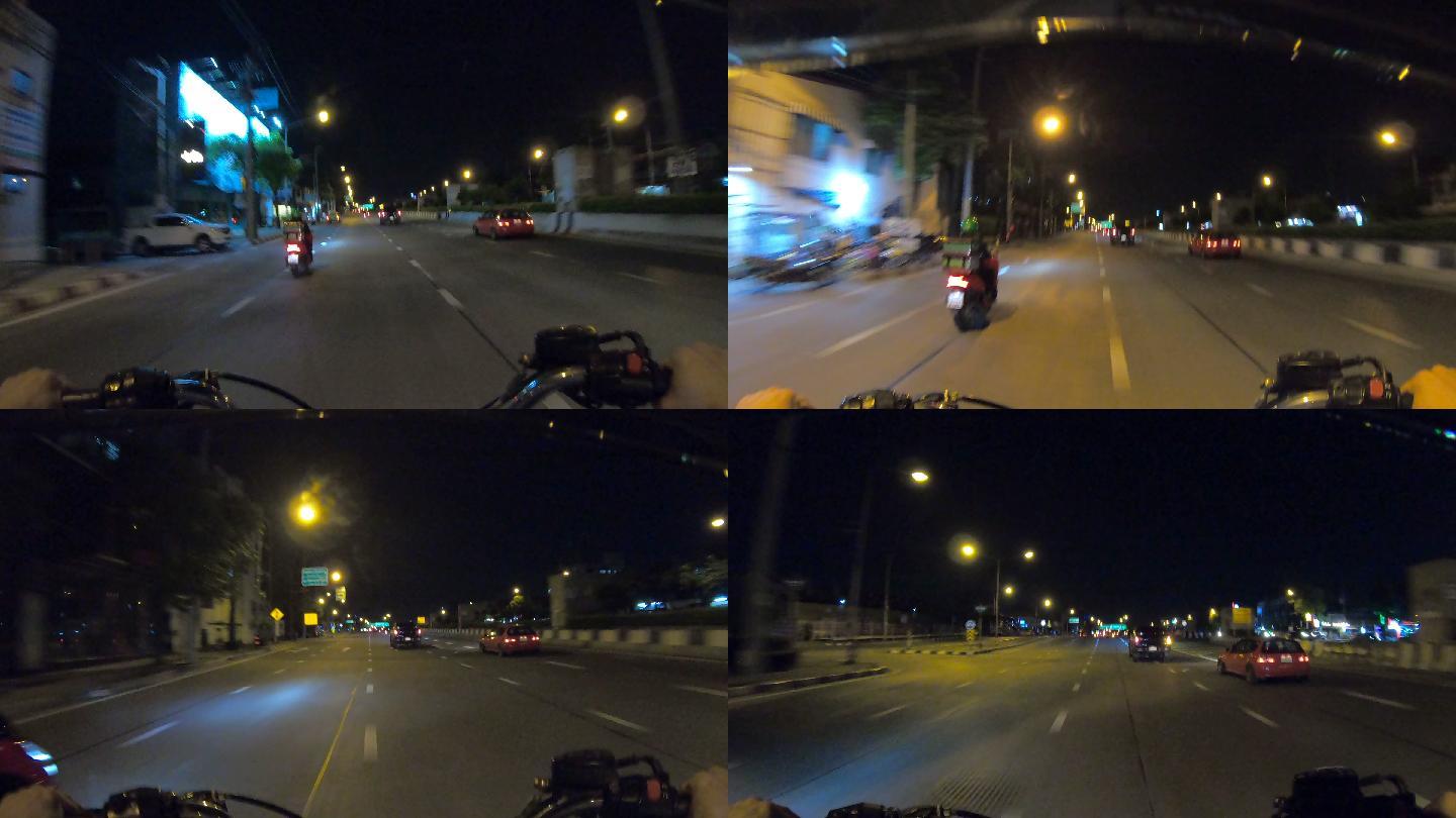泰国公路上亚洲男子骑摩托车的POV镜头。