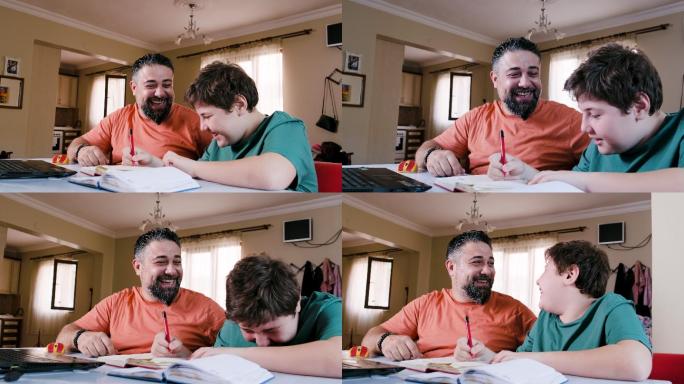 父亲在家帮儿子做作业