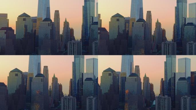 日出时从哈德逊河近距离观看曼哈顿市中心。通过电影般的镜头移动拍摄的空中镜头。