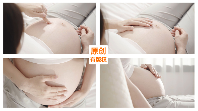 怀孕孕妇腹部特写感受胎动