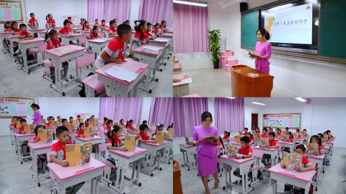 小学老师给小学生上语文课 学生认真朗读