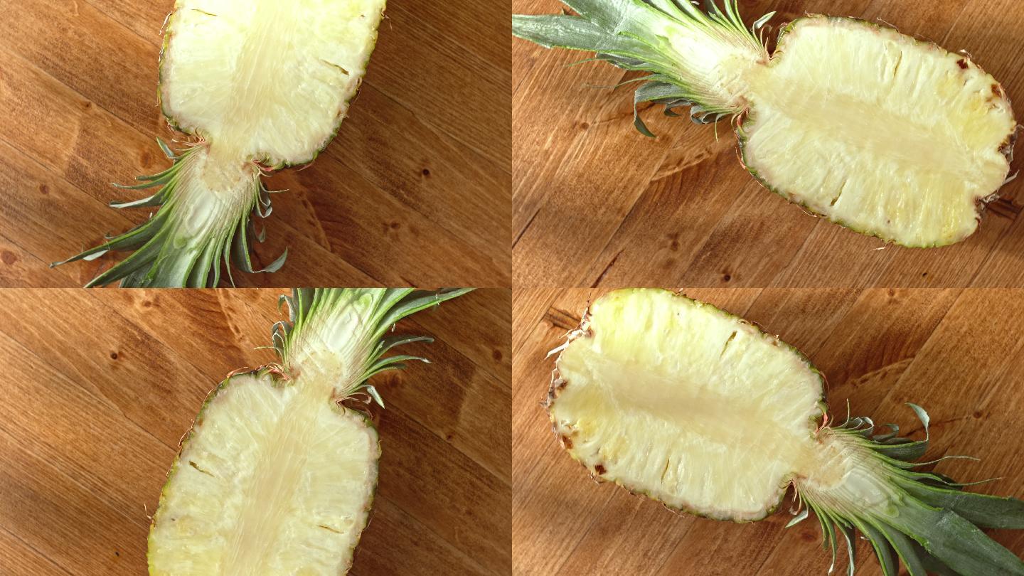 把半个菠萝放在旋转的木桌上