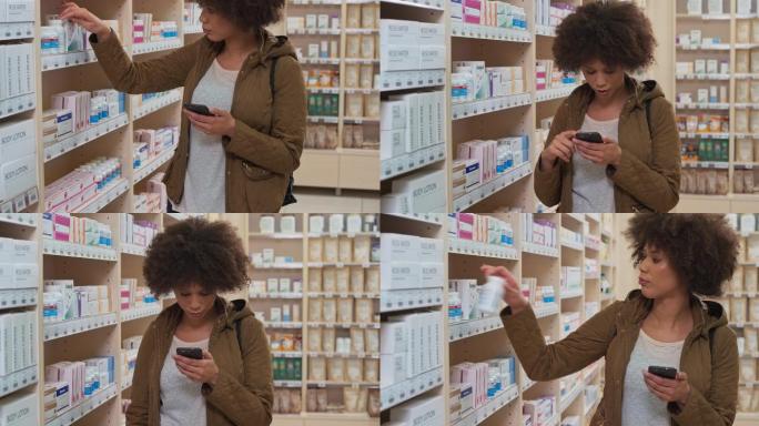 这名年轻女子在从药店货架上拿药瓶之前检查了手机