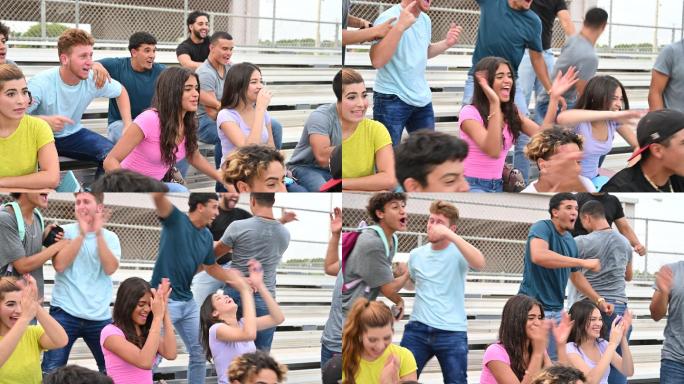 西班牙裔男女青少年在看台上欢呼