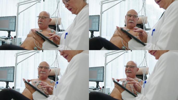 老年男子在诊所接受心脏压力测试