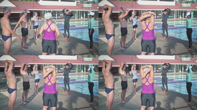 亚裔中国游泳教练在泳池边教高年级学生游泳课前的热身运动