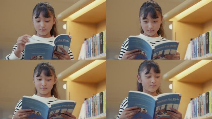 MCU女生在图书馆看书