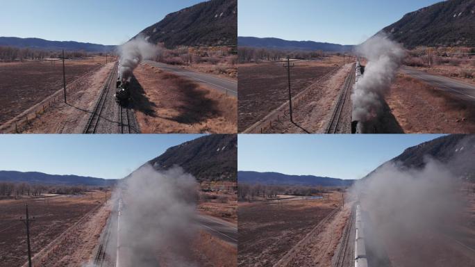 科罗拉多州杜兰戈附近公路上行驶的列车的无人机镜头