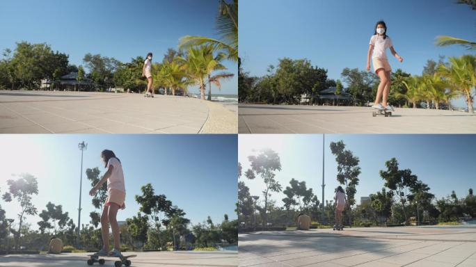 阳光明媚的日子里，亚洲女孩在公园户外玩冲浪滑板，椰子树背景，生活方式理念。