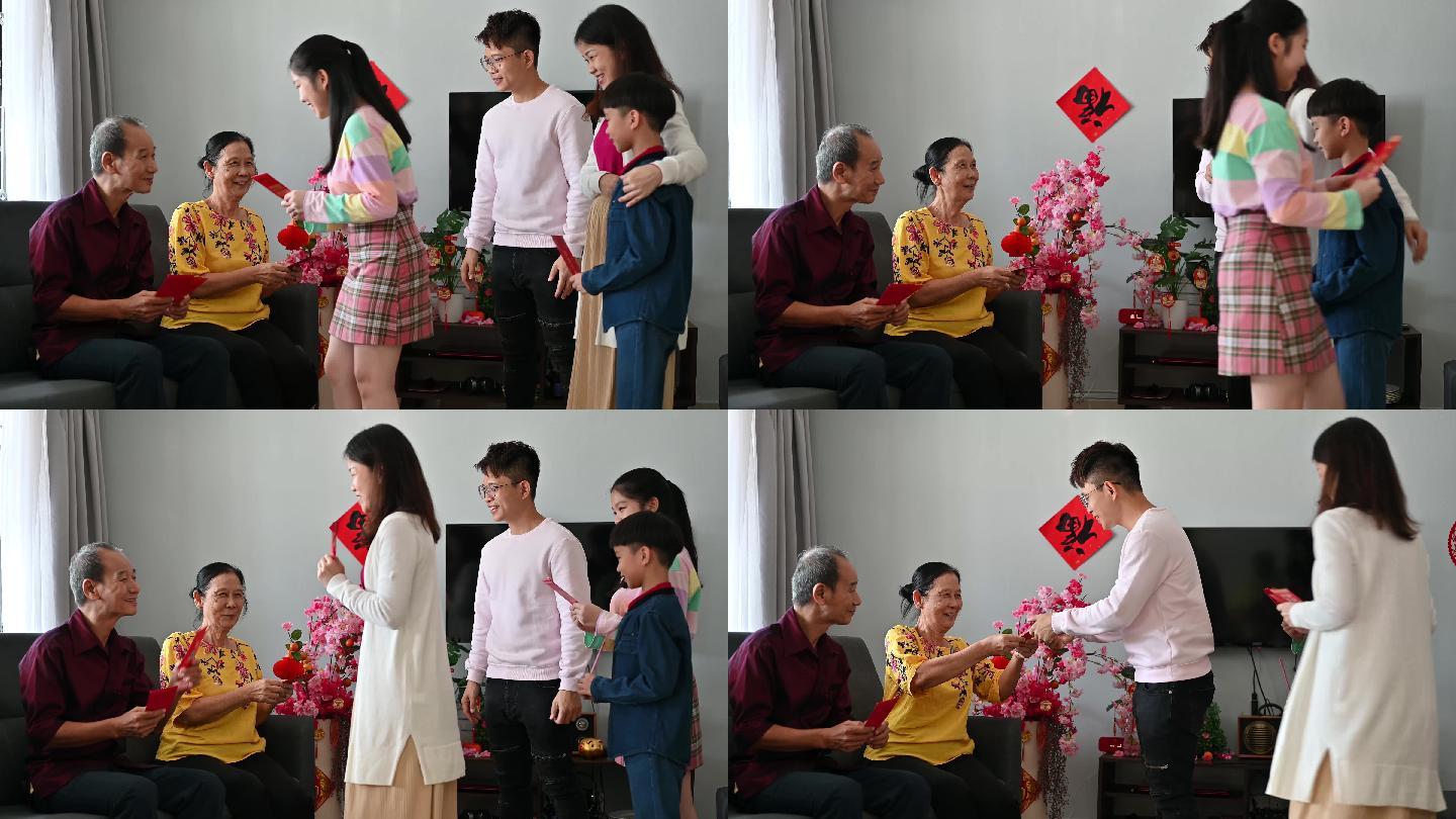 中国新年期间，亚洲家庭在客厅迎接并收到父母和祖父母的中国新年红包（Angpow）