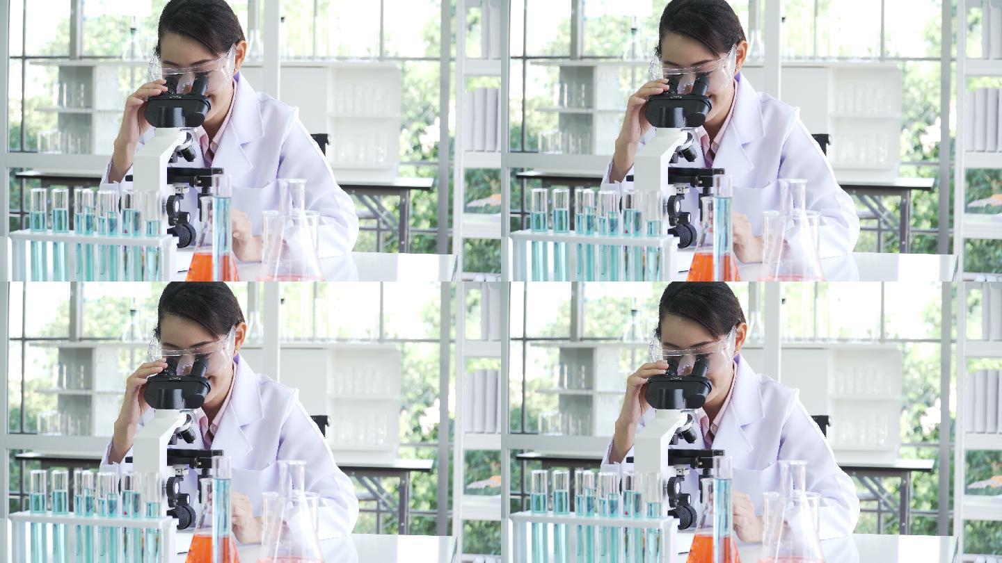 日本中年女科学家喜欢在光学显微镜上做研究