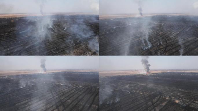 农田燃烧的火焰鸟瞰图，了解土壤肥力。